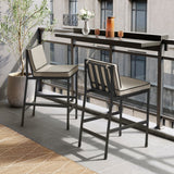 Odelia indoor/outdoor counter stool in beige – lifestyle room view
