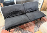 Black velvet split-back futon sofa bed - real photo, fully upright