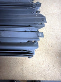 Used 48" single rivet boltless shelving rack rail – close-up of rivet ends