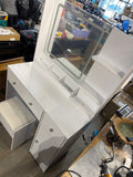 White vanity desk with LED mirror and stool – angle view of desktop