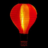 Alpine solar hot air balloon lantern – red/pink lit at night