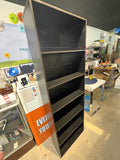 Tall and narrow black bookshelf
