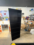 Tall and narrow black bookshelf