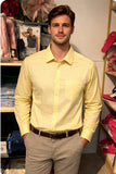 Oxford cotton. Classic button-down collar. Long sleeves with buttoned cuffs. Patch pocket on the front.Relaxed fit. Rounded hem. Yellow Lrg only