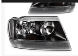 1999–2004 Jeep Grand Cherokee Black Housing Headlight Assembly Set – Left & Right