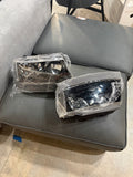 1999–2004 Jeep Grand Cherokee Black Housing Headlight Assembly Set – Left & Right