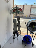 Reduced - floor model - 39" Tall Outdoor Solar Powered LED Lights Girl and Boy Silhouette with Umbrella Yard Statue
