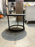 Reduced - Minor Scratches Modern round nesting coffee table with MDF top and a black metal frame.
