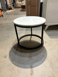 Reduced - Minor Scratches Modern round nesting coffee table with MDF top and a black metal frame.