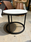 Reduced - Minor Scratches Modern round nesting coffee table with MDF top and a black metal frame.