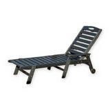 Domi black HDPE chaise lounge chair with arms and rear wheels – manufacturer side view on white