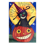 Happy Halloween garden flag – black cat in a jack-o'-lantern pumpkin