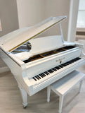 Wm. Knabe & Co. white grand piano – angled view showing keyboard and lid