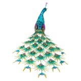 Rear-quarter view of jumbo peacock statue showing green jeweled tail feathers