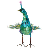 Close front view of iron peacock statue with teal body and jewel embellishments