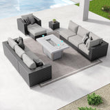 Sirio Soho modular outdoor sectional, charcoal woven resin wicker with taupe Sunbrella cushions – full layout shown with fire table (stock photo; fire table sold separately)