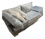 OVE Decors Torrance outdoor wicker arm loveseat and ottoman, gray cushions – real photo of this set, angled view, still in plastic, on white