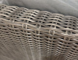 OVE Decors Torrance outdoor wicker arm loveseat and ottoman, gray cushions – real photo, close-up of the gray resin wicker weave